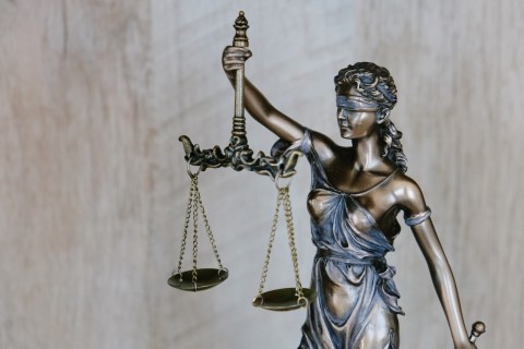 Justice is blind woman scales Tingey Injury Law Firm Unsplash