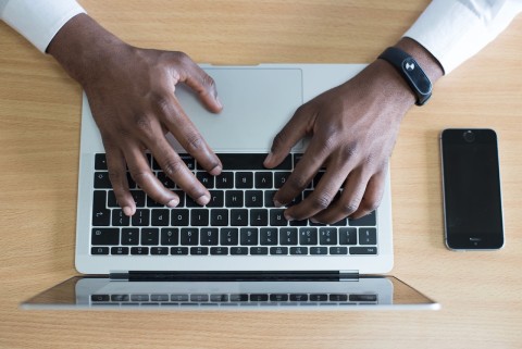 man typing keyboard Cytonn Photography Unsplash