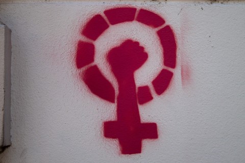 woman power logo graffiti photo Jens Maes Unsplash