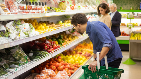 man shopping at grocery store