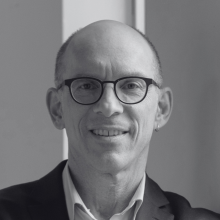 A black and white headshot of Peter Bleyer